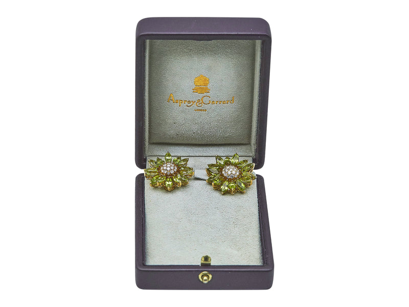 A Pair of Asprey & Garrard Daisy Ear Clips